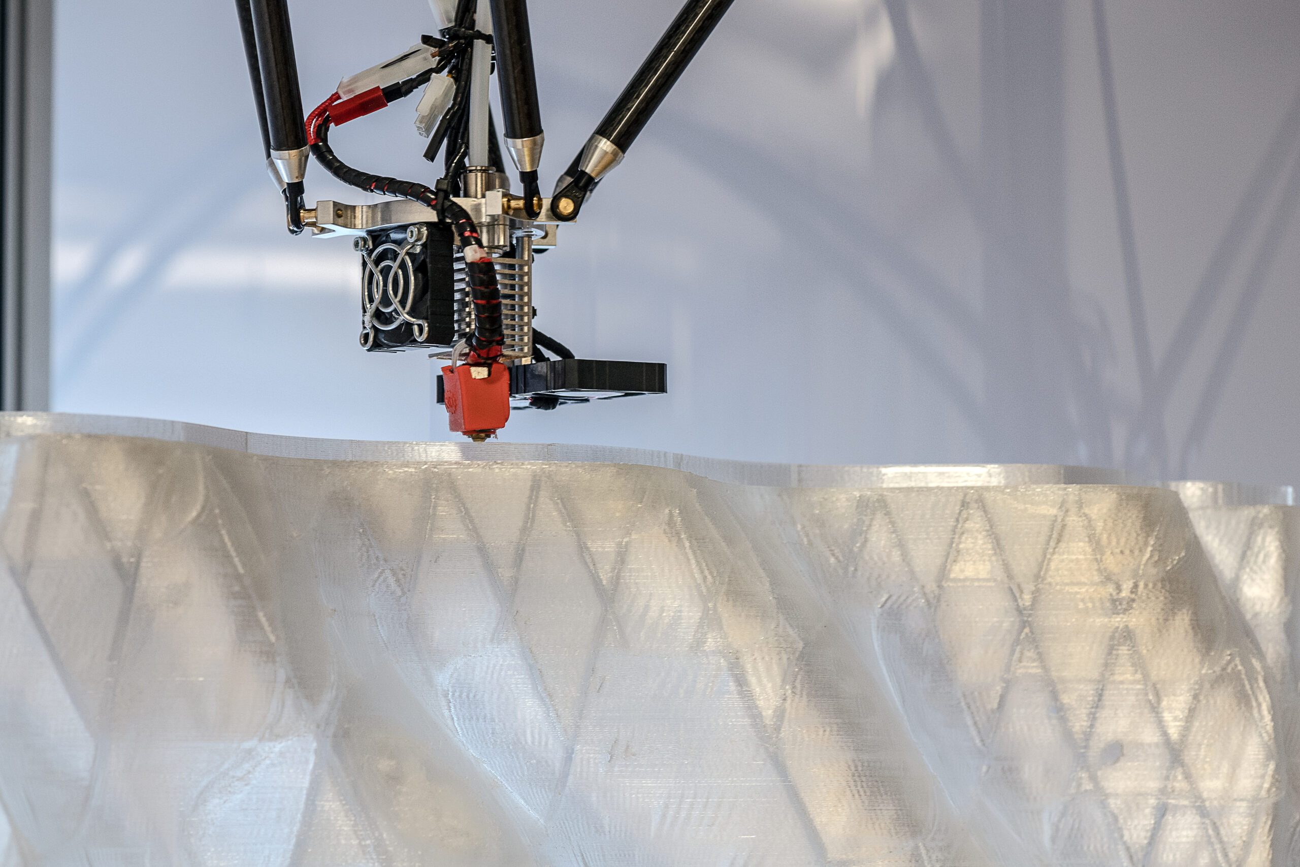 A 3D printer printing a functional Integrated building envelope