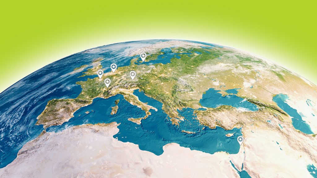 Key visual of the EuroTech Visiting Researcher Programme showing part of a globe with location pins for each EuroTech University